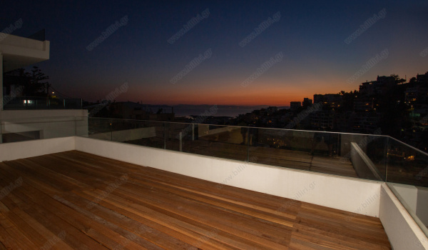 25_living_room_balcony_sea_view_sunset